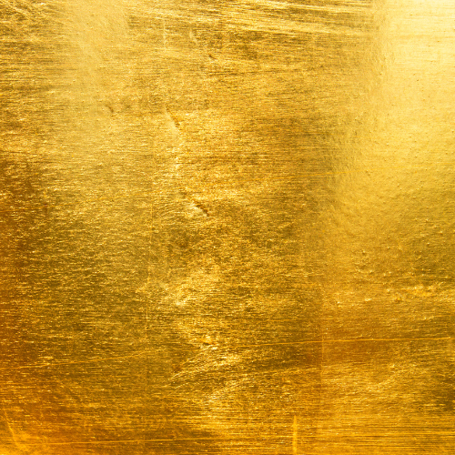 Close-up of a textured gold surface.