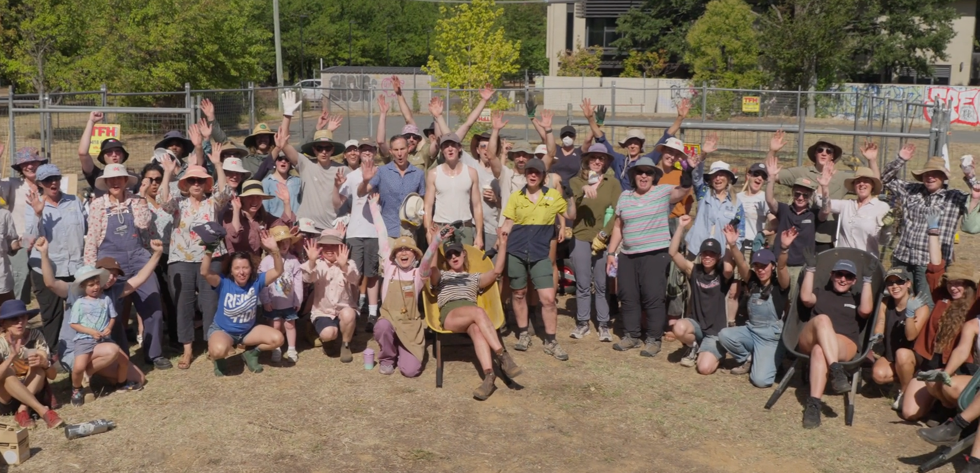 A large group of people, including Cecelija (Founder, Bluebell Horticulture Studio) gathered to celebrate a day of voluntary landscaping at social enterprise cafe, Stepping Stone, in Dickson, Canberra.
