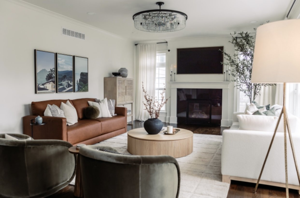 living room with two chairs and a couch