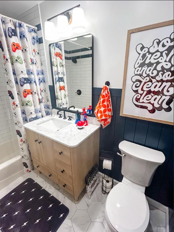 fun kids bathroom with video game theme