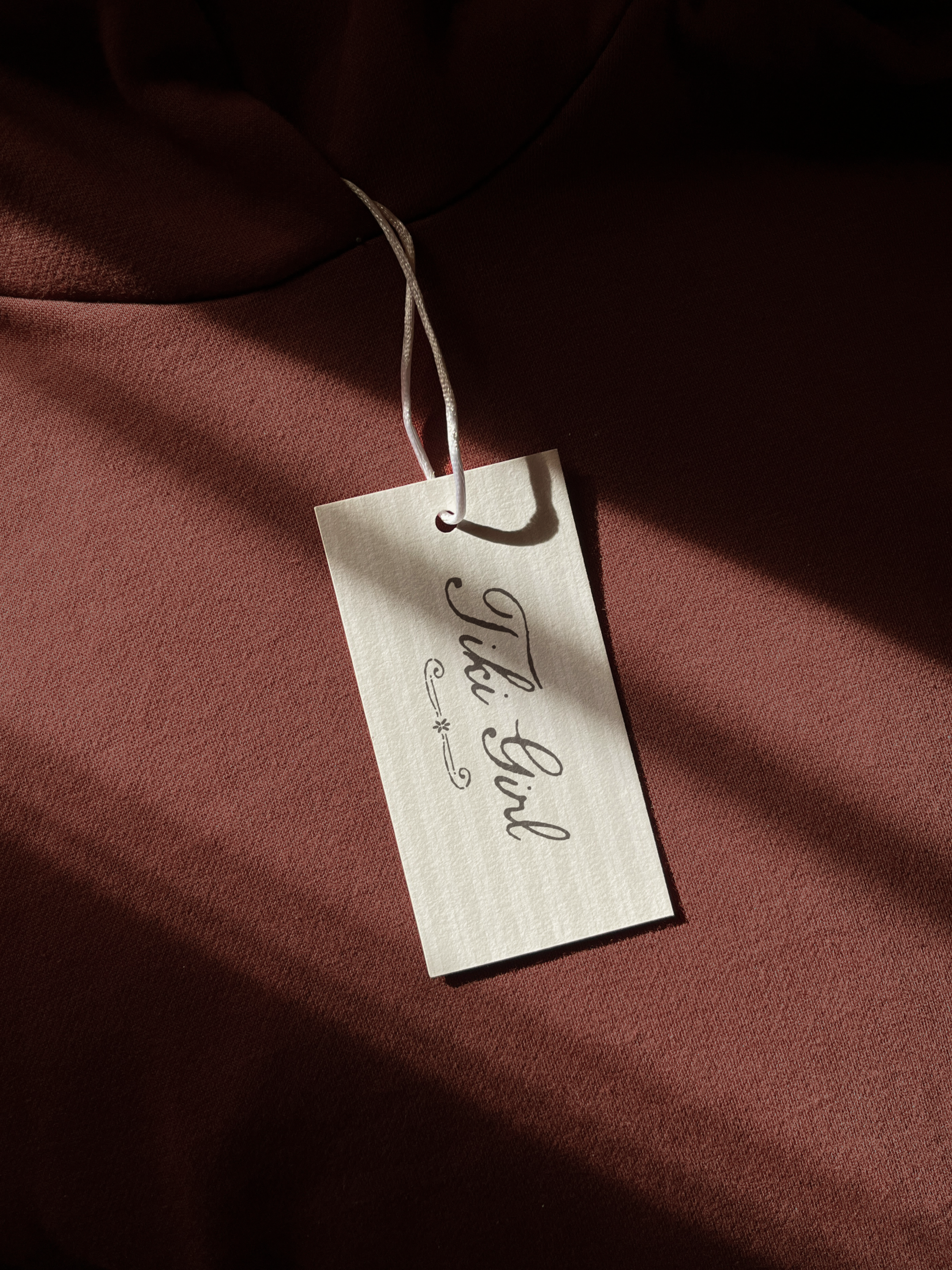 Hang Tag with Tiki Girl Logo