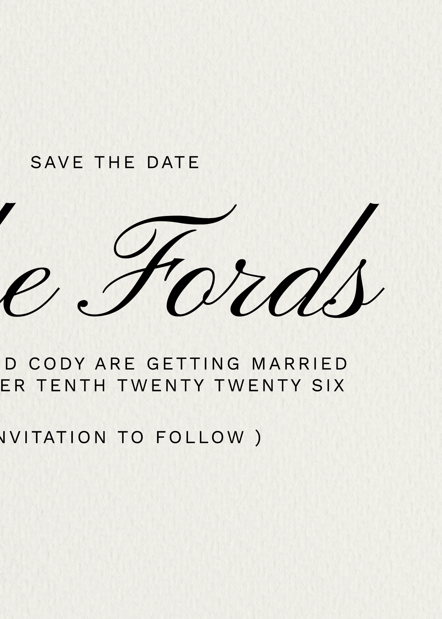 Wedding save the date card with elegant black script and printed text on a textured white background.