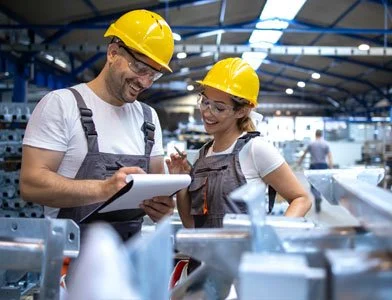 Industrial workers in hard hats