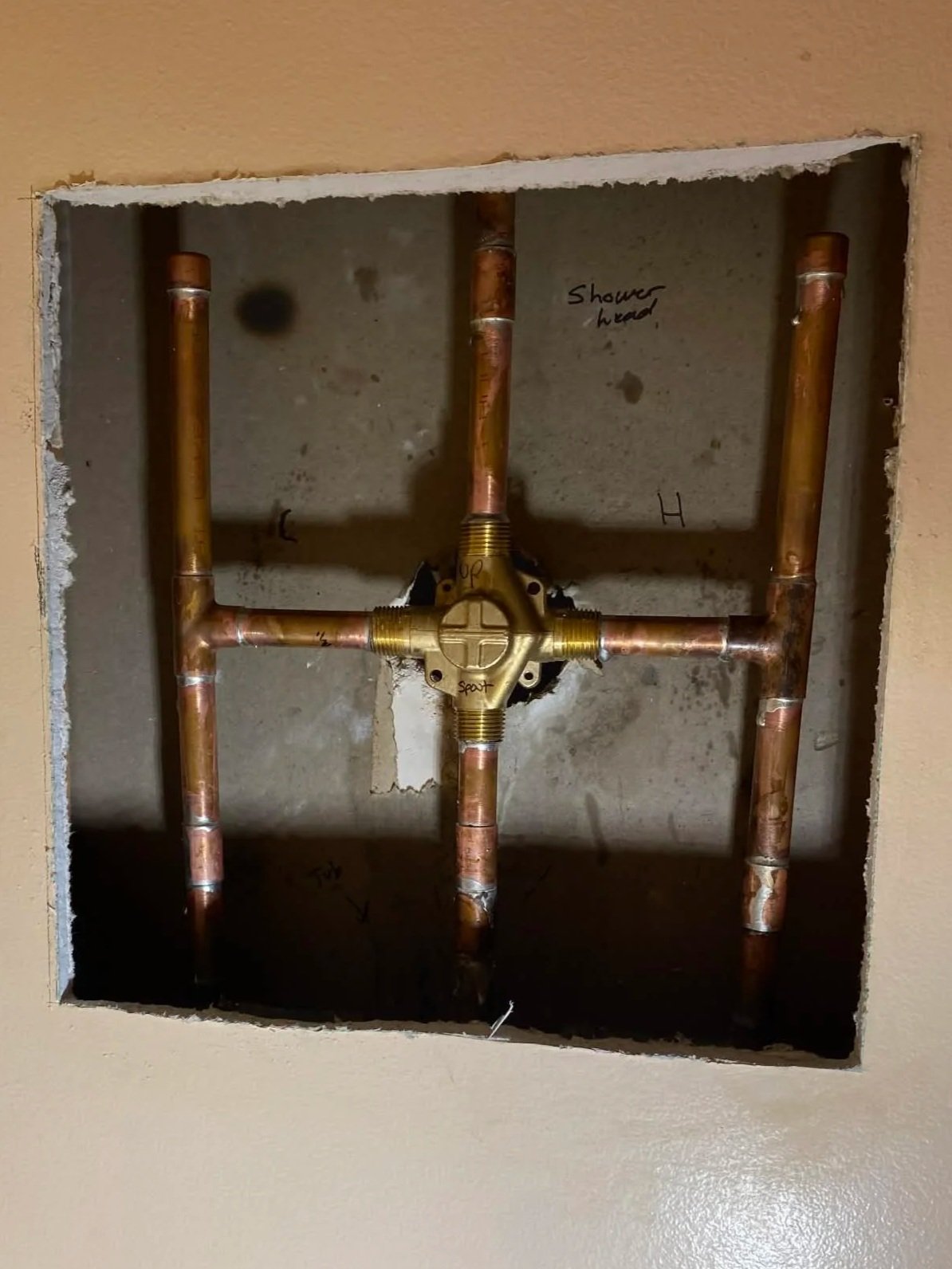 Licensed plumber installing residential plumbing system in Ottawa home