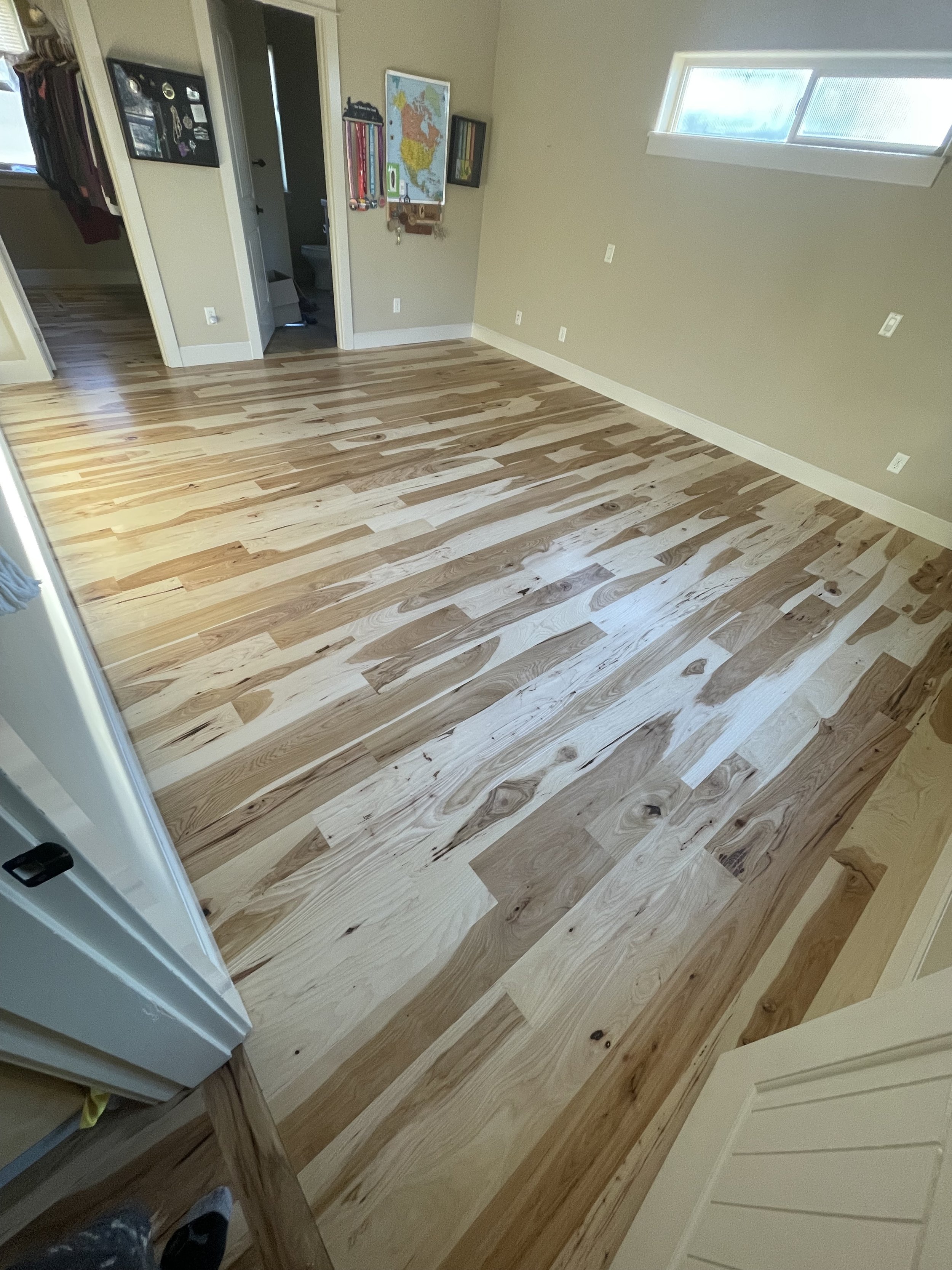 Newly installed and refinished 3/4" solid hickory floor.
