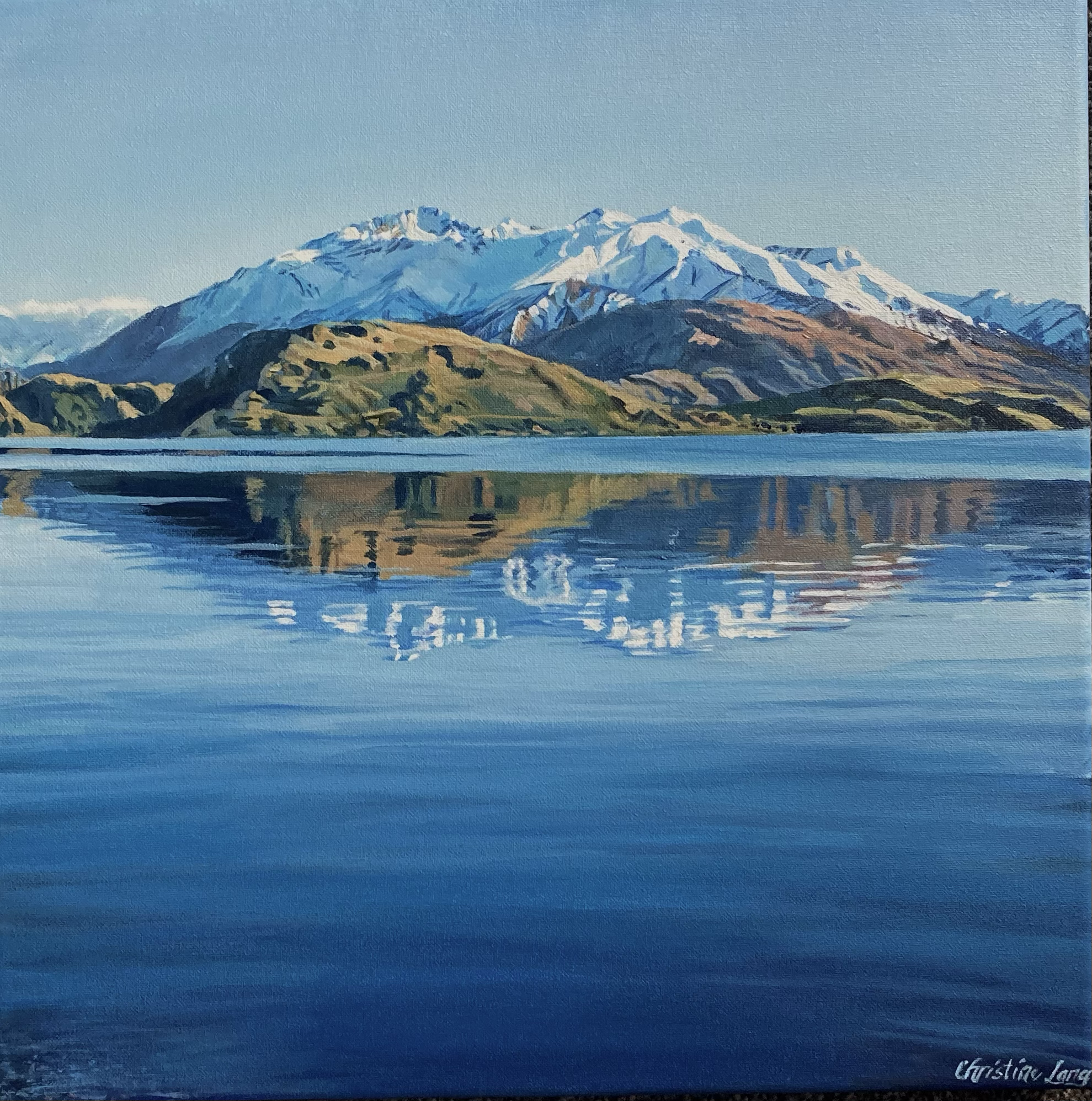 Painting of a mountain landscape with snow-capped peaks, green hills, and a calm blue lake reflecting the scenery.