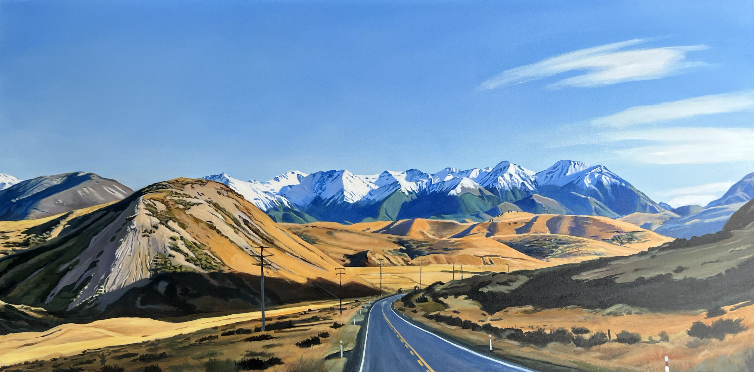 A painted landscape of a winding road leading through dry, rolling hills toward snow-capped mountains under a clear blue sky.