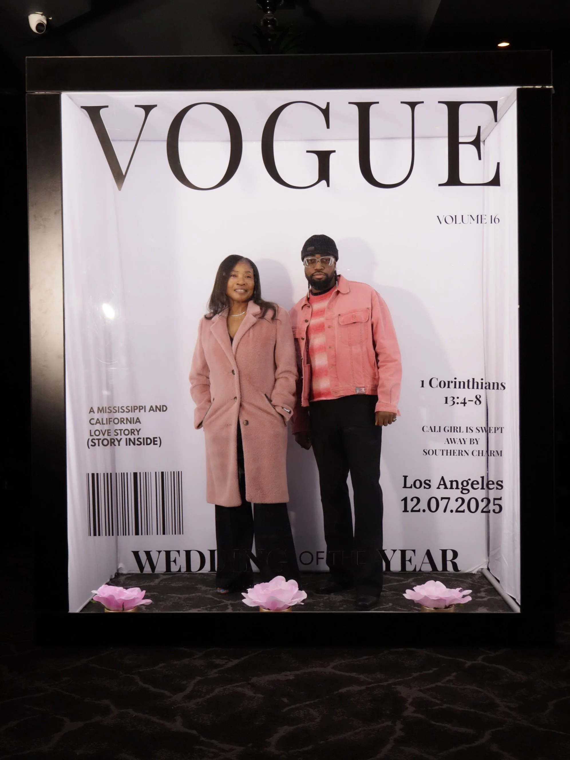 Fake magazine cover with two people standing inside a frame designed to look like a Vogue magazine cover, with large text reading 'VOGUE' and various smaller text, including event details and a story about Mississippi and California love story.