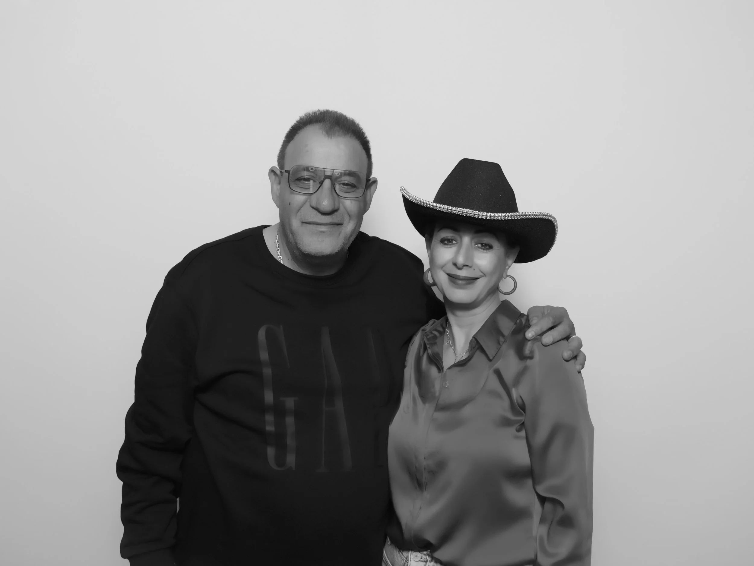 Wedding guests smiling at an open air photo booth rental in Burbank by 818 Photo Booth