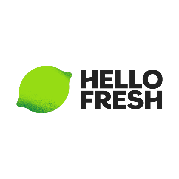 A green lemon with a pink and purple stem next to the text 'HELLO FRESH' in black on a green and blue background.