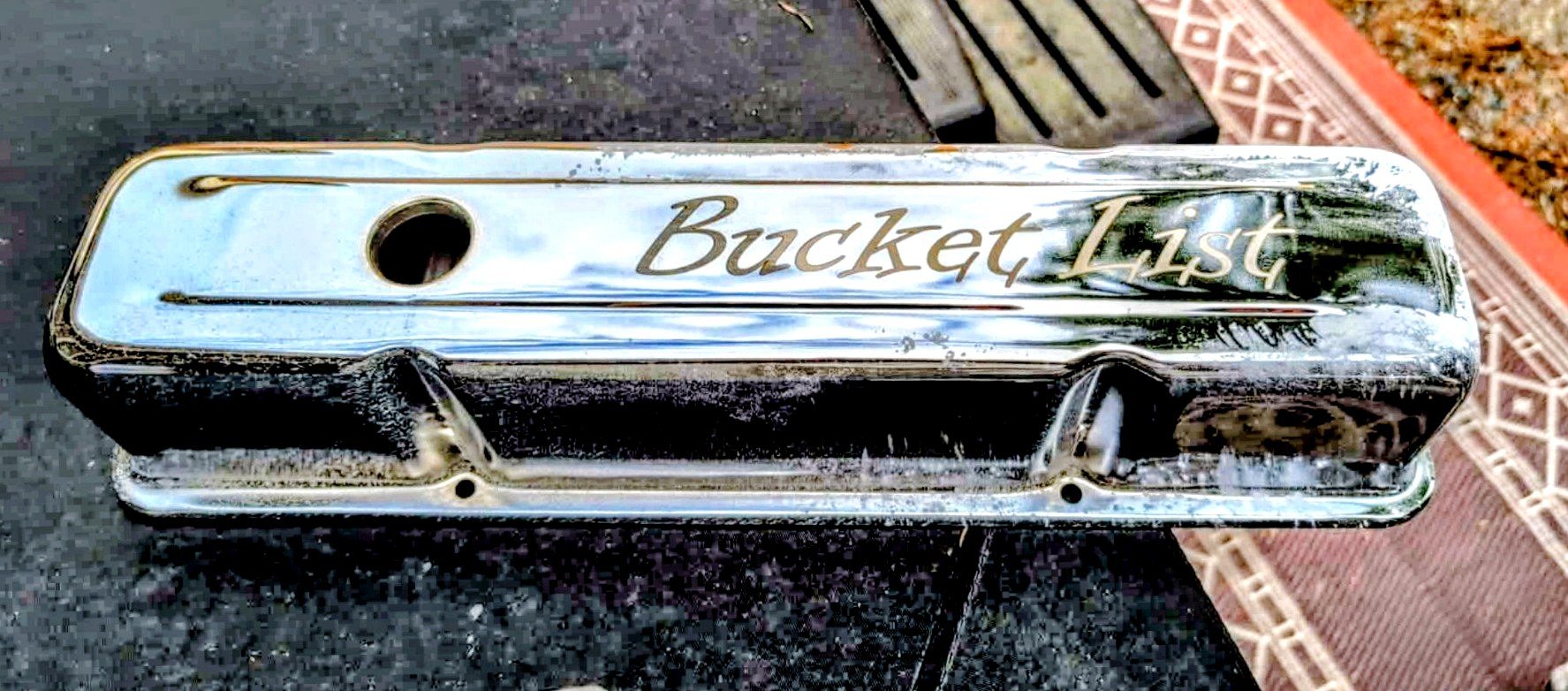 Valve cover painted with a hand-lettered bucket list