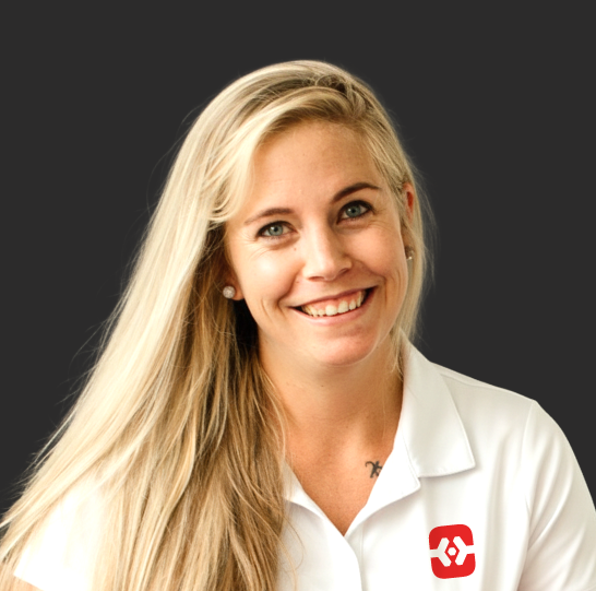 Linds wearing a white polo shirt with a ProCon logo