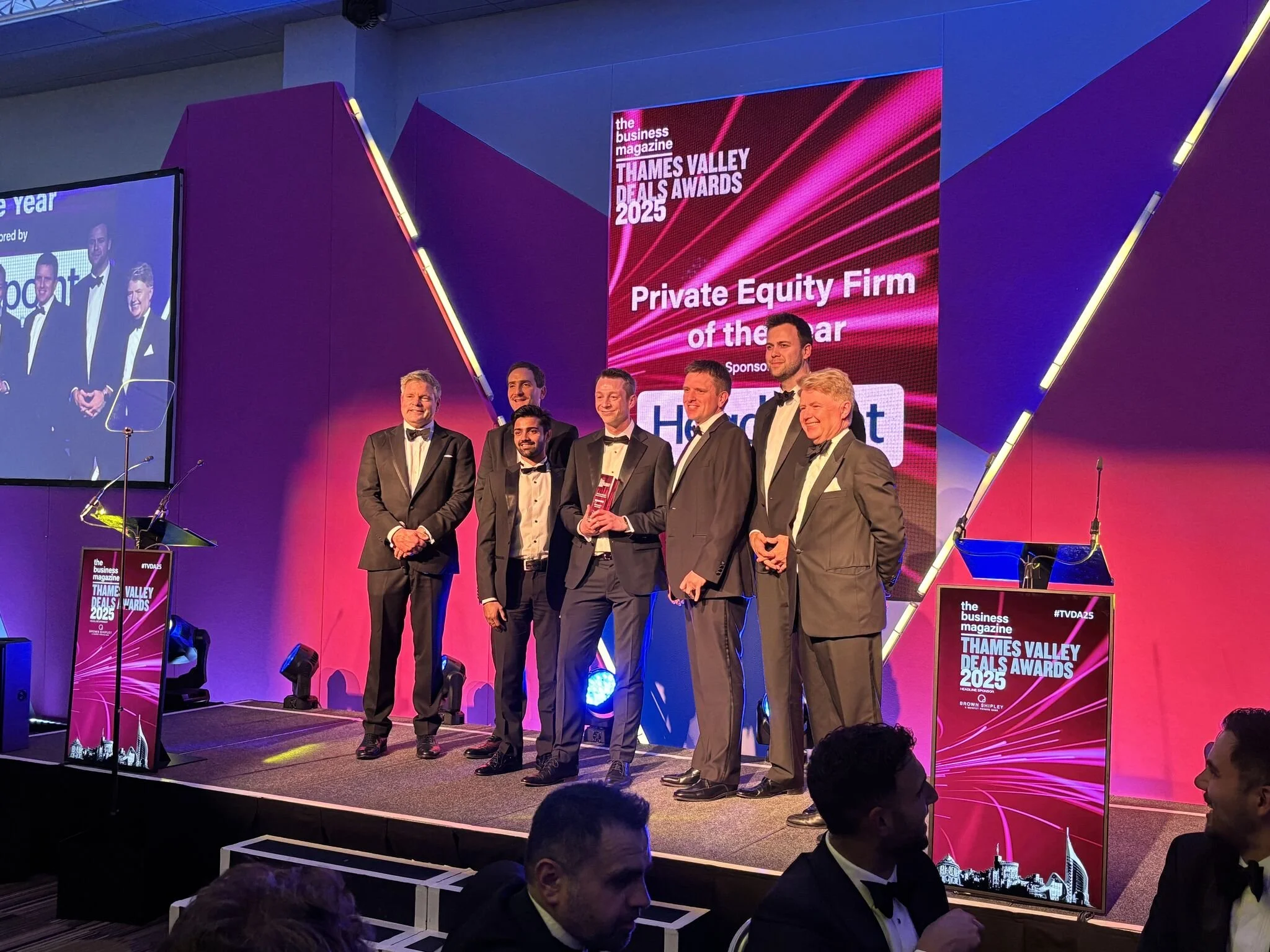 YFM Equity Partners, a private equity firm, winning PE firm of the year. Includes Jamie Roberts.