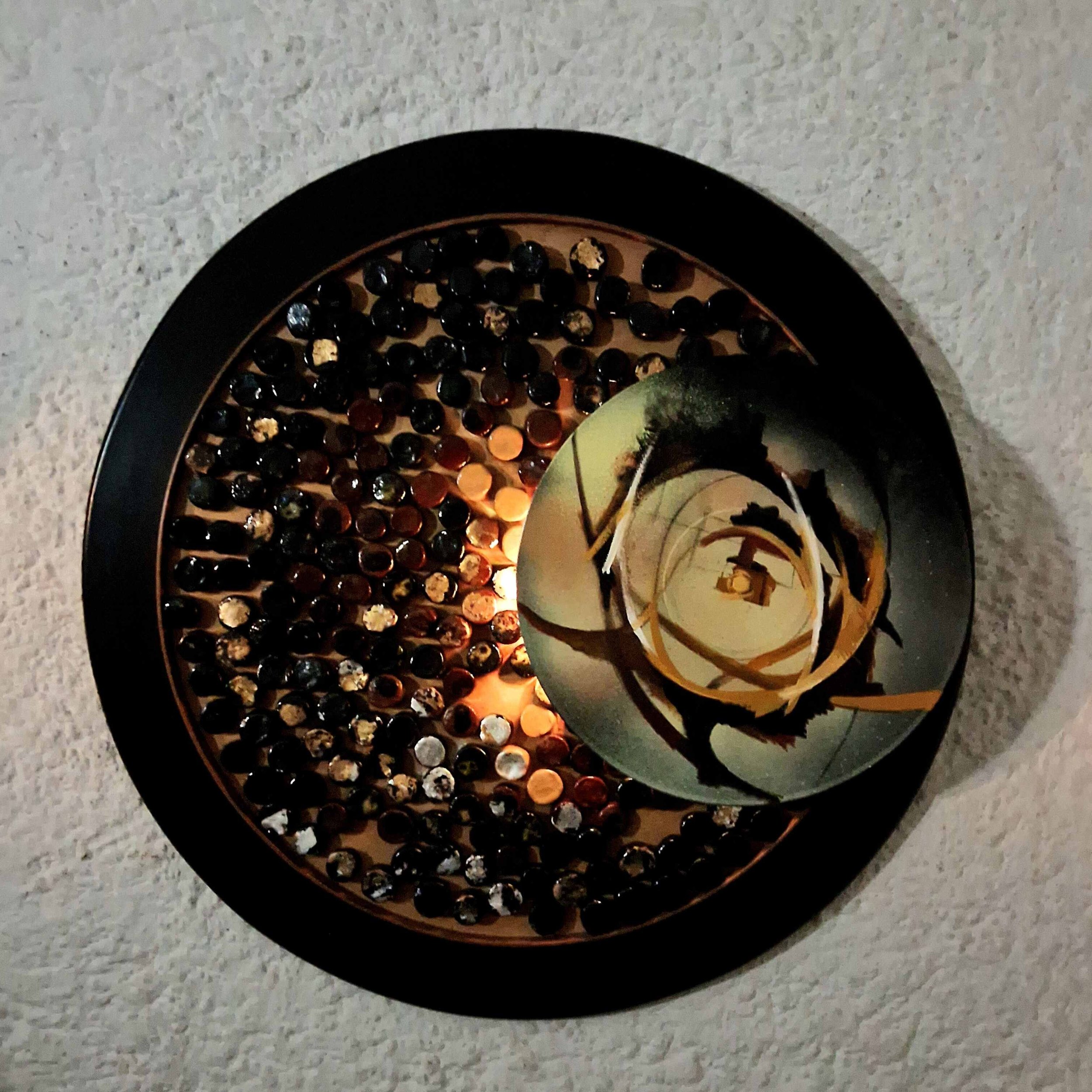 False Eclipse  
| Ceramics on Wood, LED Light, Vinyl Record, Gold and Silver Laminates, Acrylics and Oils  
| 65 cm (Diameter)