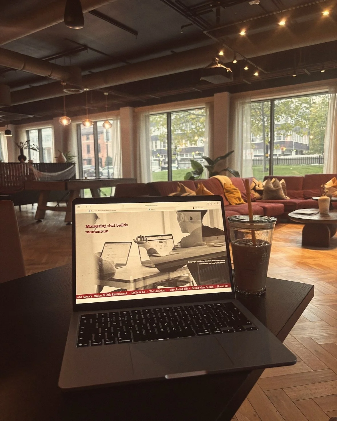 GIGI Marketing website open on a laptop