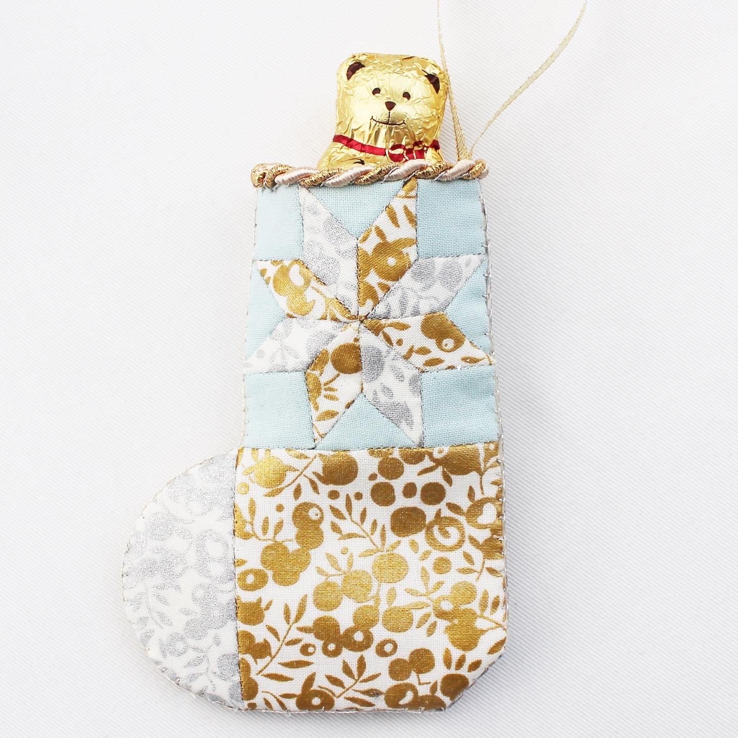 small stocking made with English paper piecing patchwork