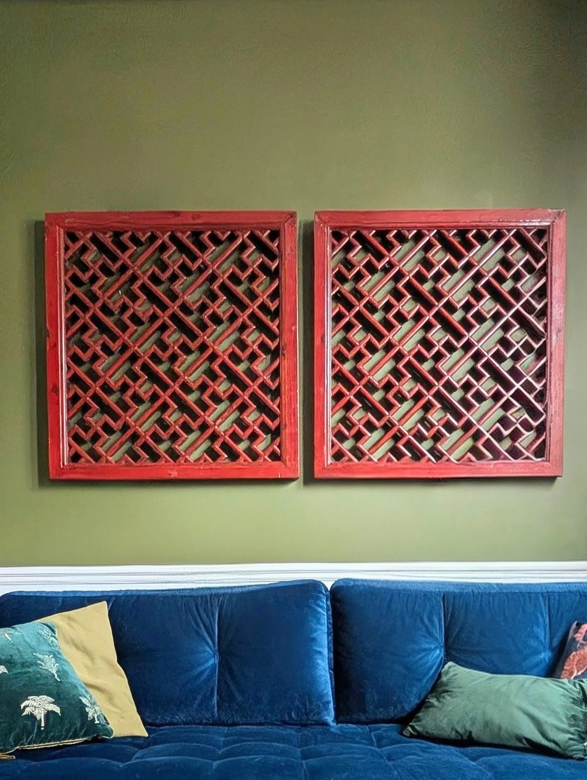A pair of Chinese lacquered wood window panels