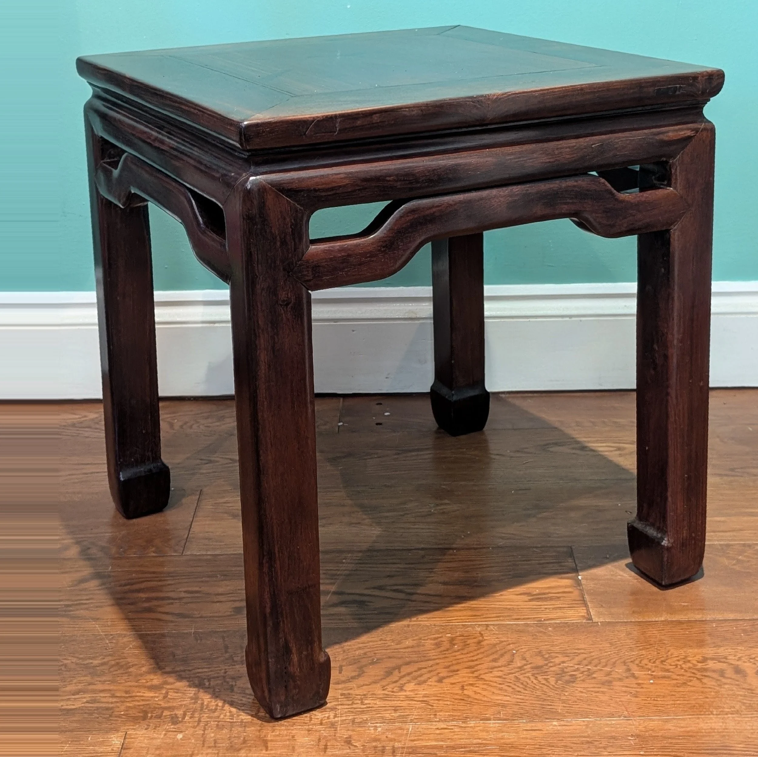 A Chinese hardwood side table