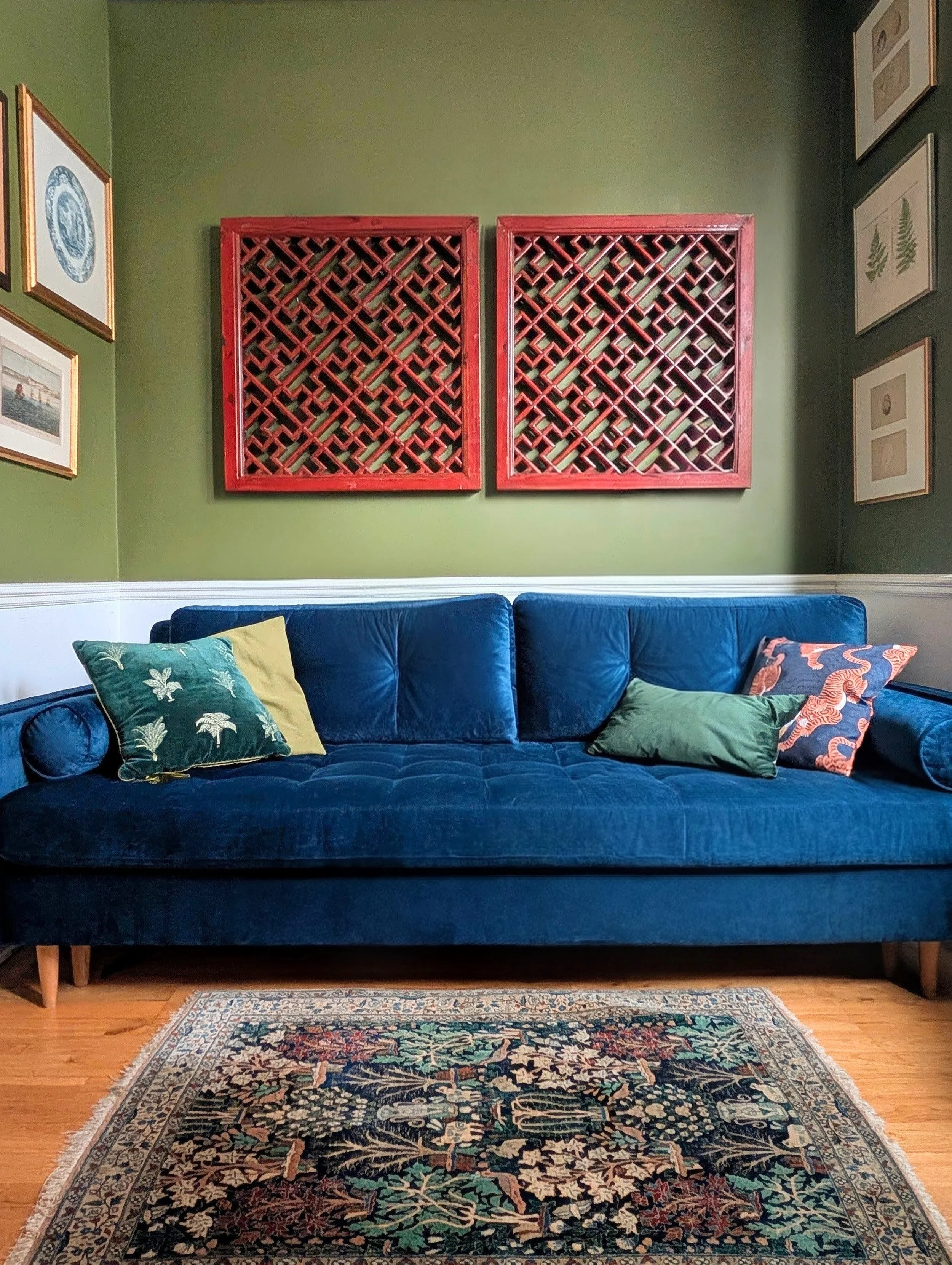 A pair of Chinese lacquered wood window panels