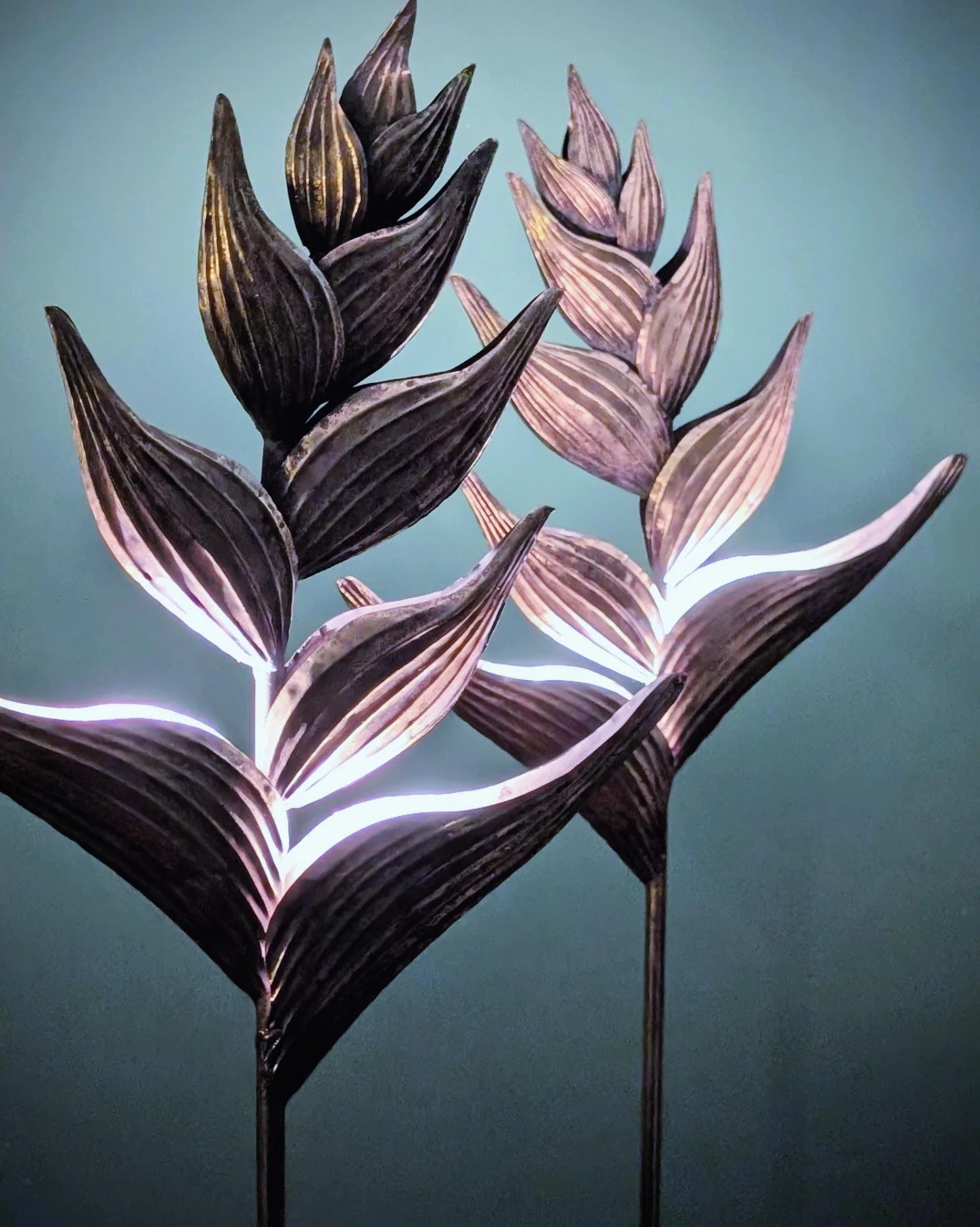 A pair of Heliconia floor lamps