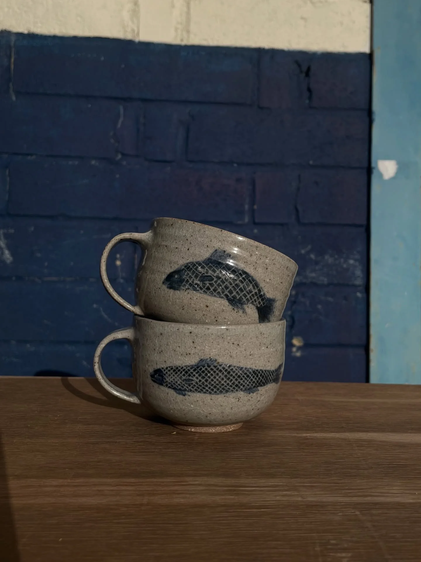 School of fish 
Footed mugs, slip and sgraffito design and gas fired. 
Two of these coming to Loam pop up which opens tomorrow 11am! 198 Hackney Road, the rest are going to go up on my Webshop Update on Saturday morning :) 

#pottery #scraffito #gasf