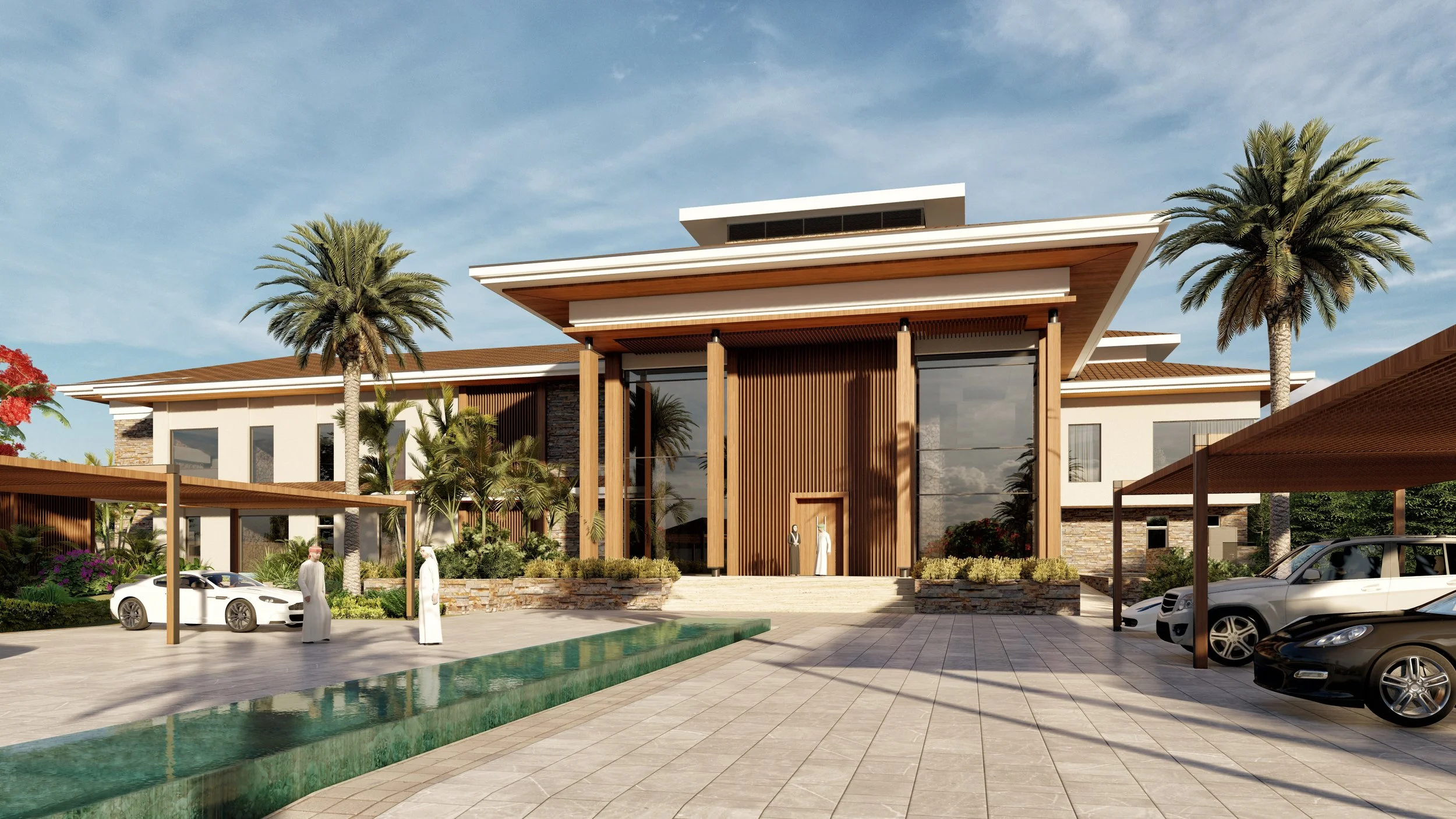 Modern luxury building with large glass windows, surrounded by palm trees, with a parking area and cars in the foreground