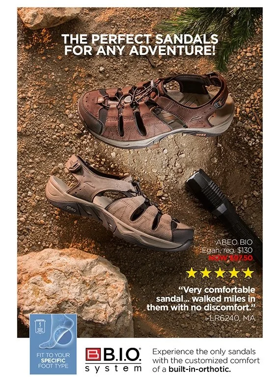 A trail setting with two pairs of B.I.O. adventure sandals, a flashlight, and rocks, highlighting the sandals' comfort for outdoor activities. The image contains text promoting the sandals and a customer quote.