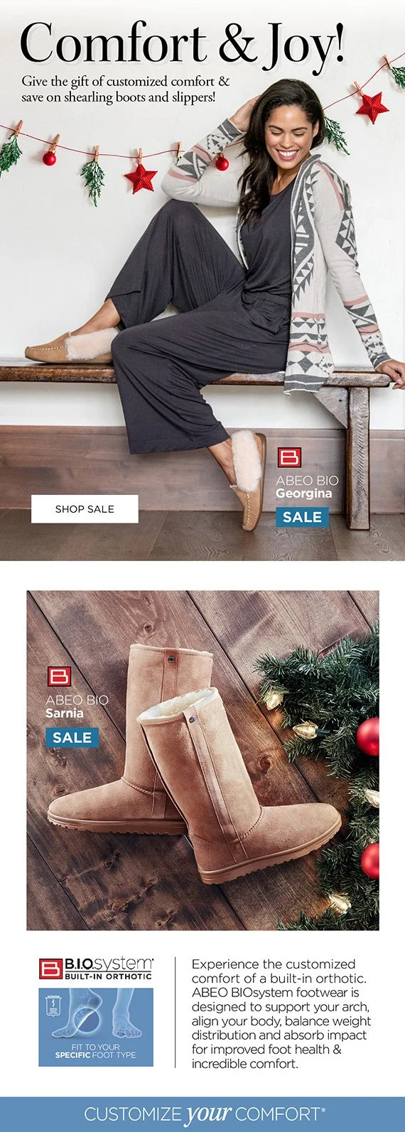 Holiday-themed advertisement featuring cozy footwear. A smiling woman wearing a long nightgown and a patterned cardigan sits on a bench, wearing shearling slippers. Below, close-up of beige shearling boots on a wooden floor with Christmas decorations