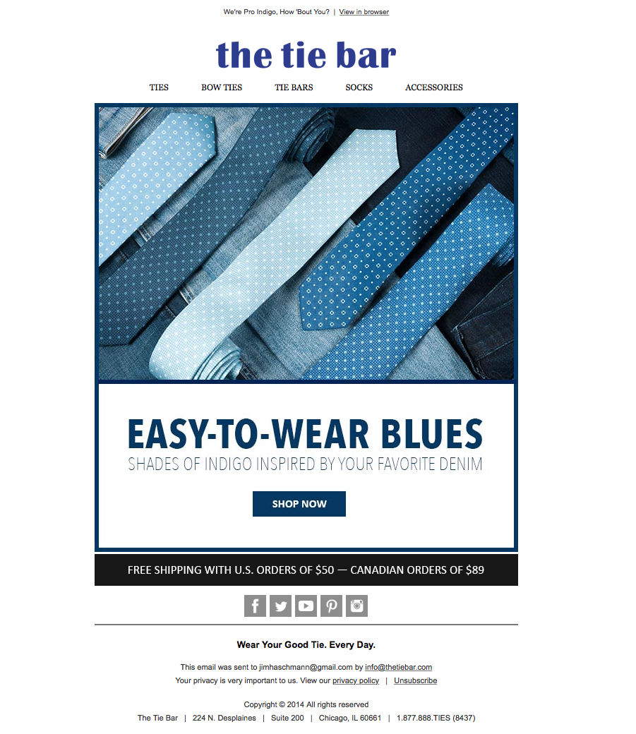 A collection of blue ties and dress shirts displayed on a flat surface, promoting men's neckwear and accessories.