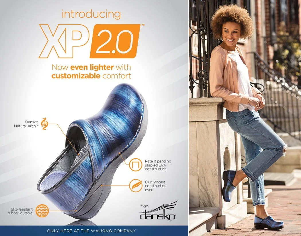 Advertisement for XD 2.0 shoes featuring a woman wearing the shoes while casually leaning against a building on a city sidewalk; shoe close-up highlights its features.