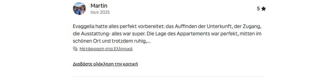 Screenshot of a positive online review in German about an apartment in Evaggelia, describing it as well-prepared, with excellent amenities, located in a beautiful, quiet area.