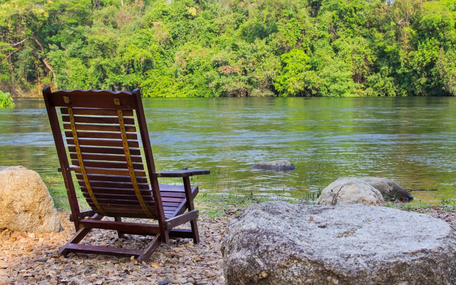 Relaxing view of river from a beach chair on the shore