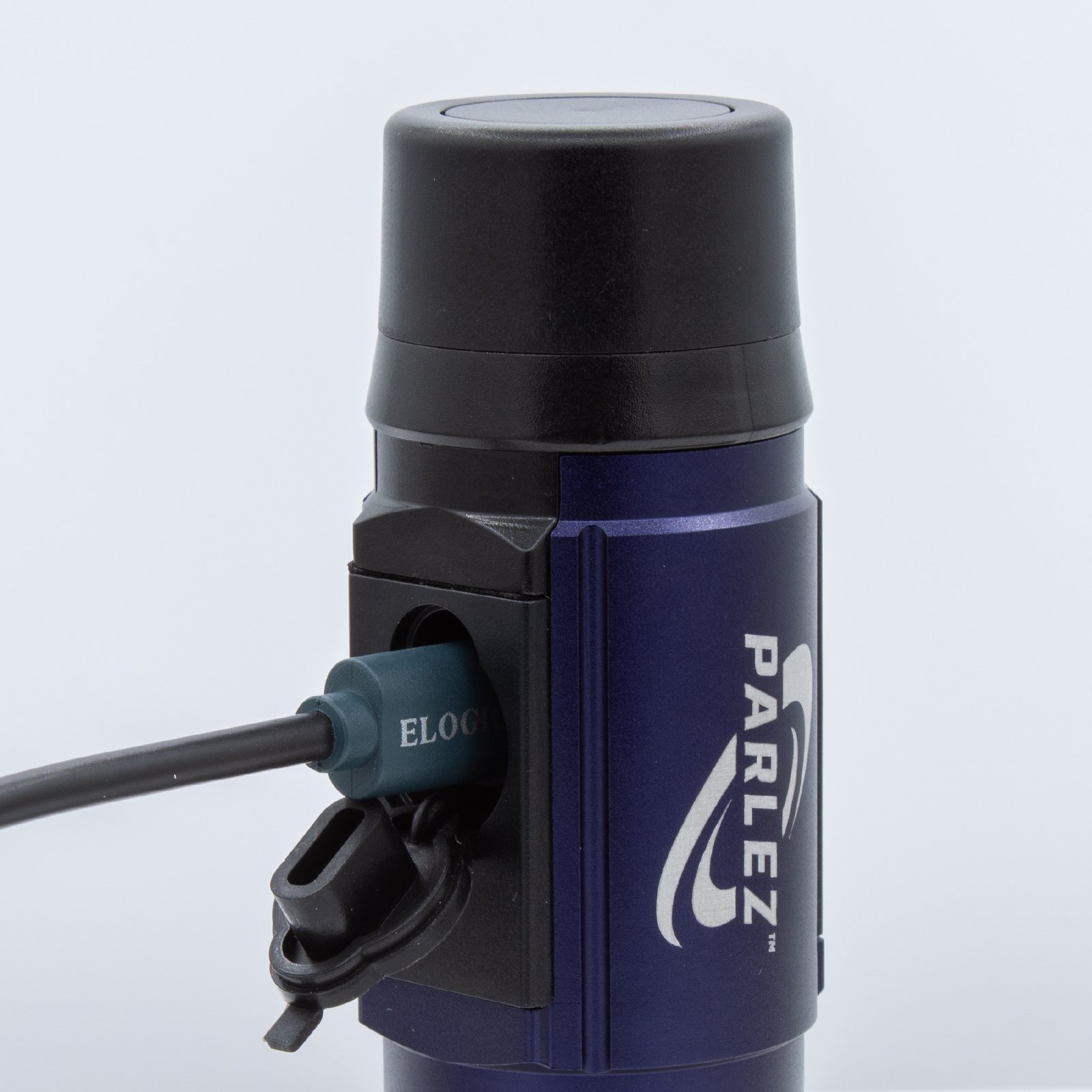 Parlez™ electrolarynx close-up of USB-C charging port and high-capacity battery compatibility.