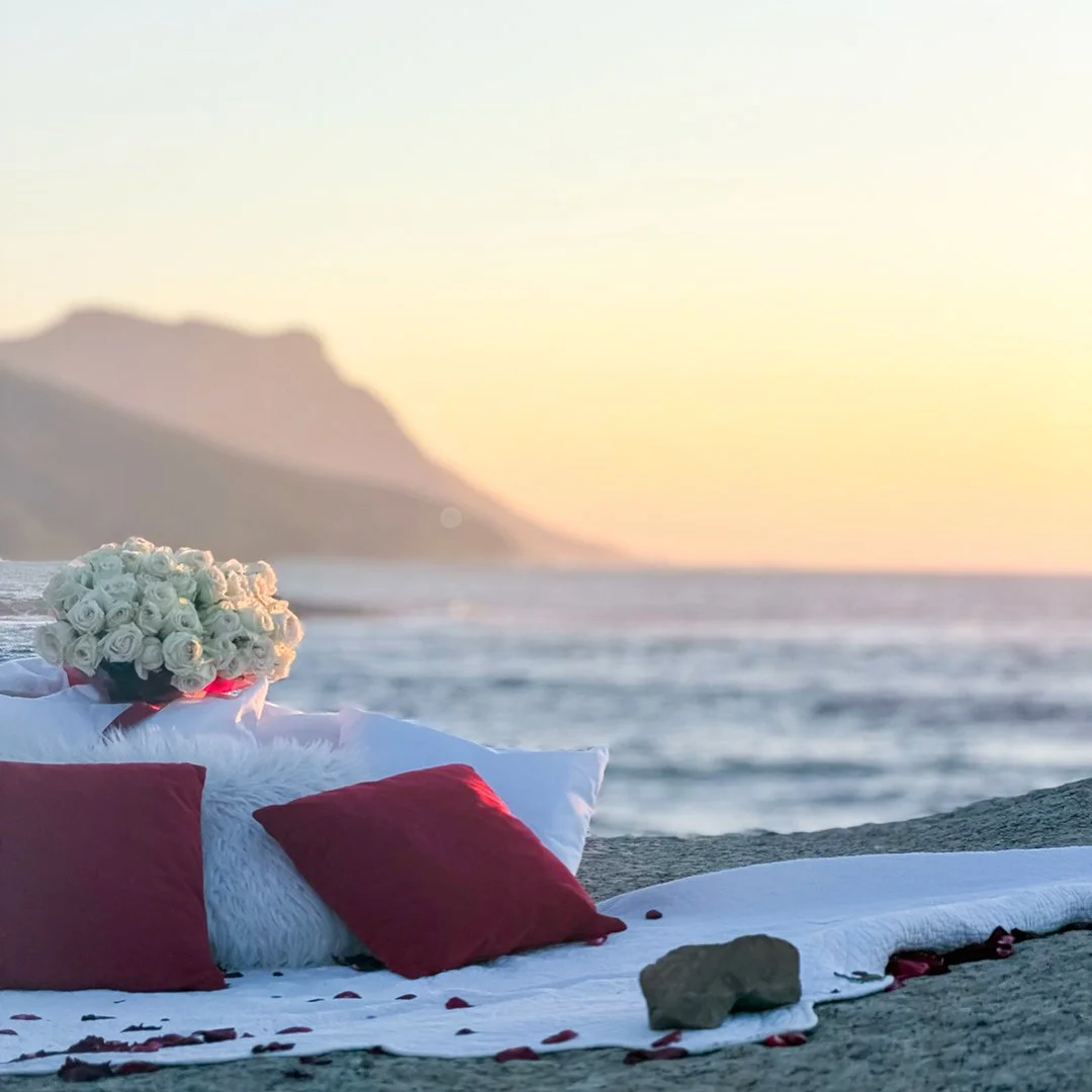 Live violin performance during a sunset proposal in Camps Bay
