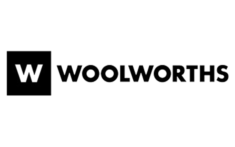 Close-up of a WOOLWORTHS logo with a black background and white lettering.