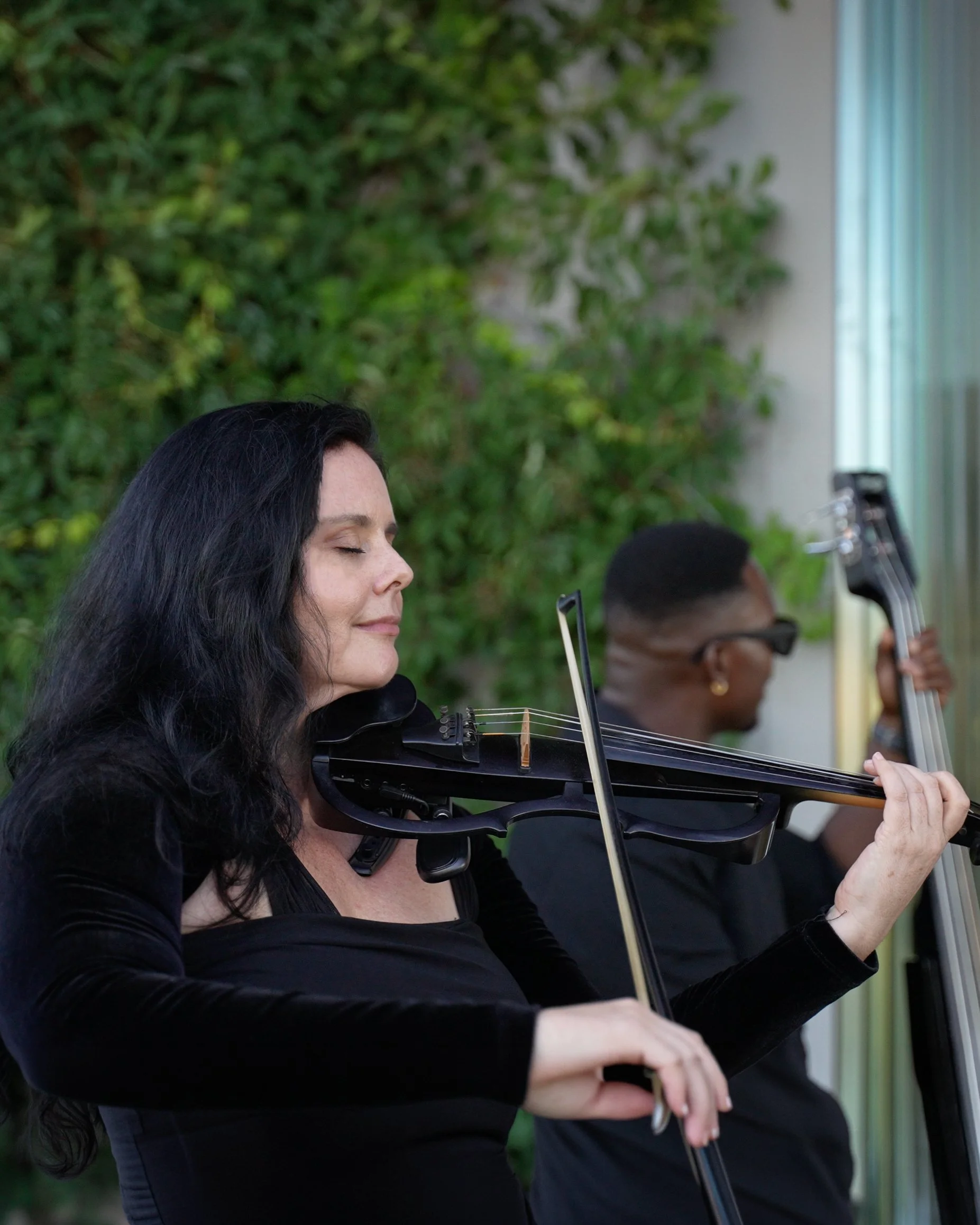 Live violin entertainment for corporate event at Quoin Rock Wine Estate