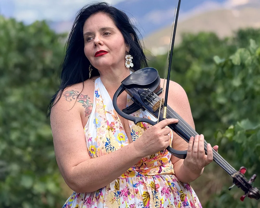 Larah Eksteen, Cape Town violinist, performing at a picturesque vineyard wedding in Montagu, Western Cape.