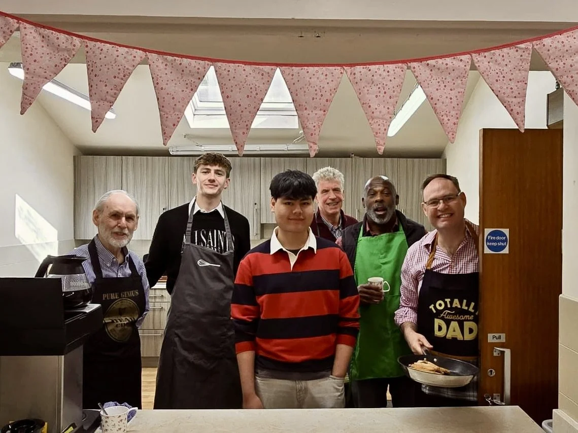 six men in the kitchen