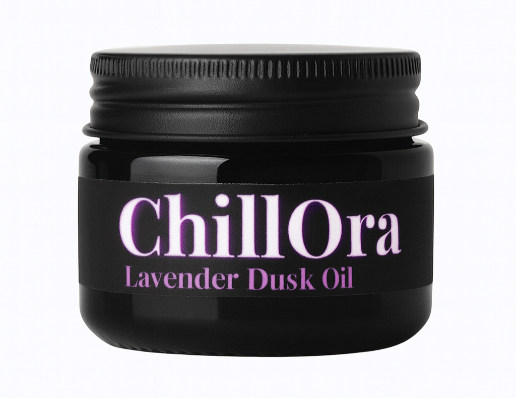 A black jar of Chillora Lavender Dusk Oil with a black lid and a purple and white label.