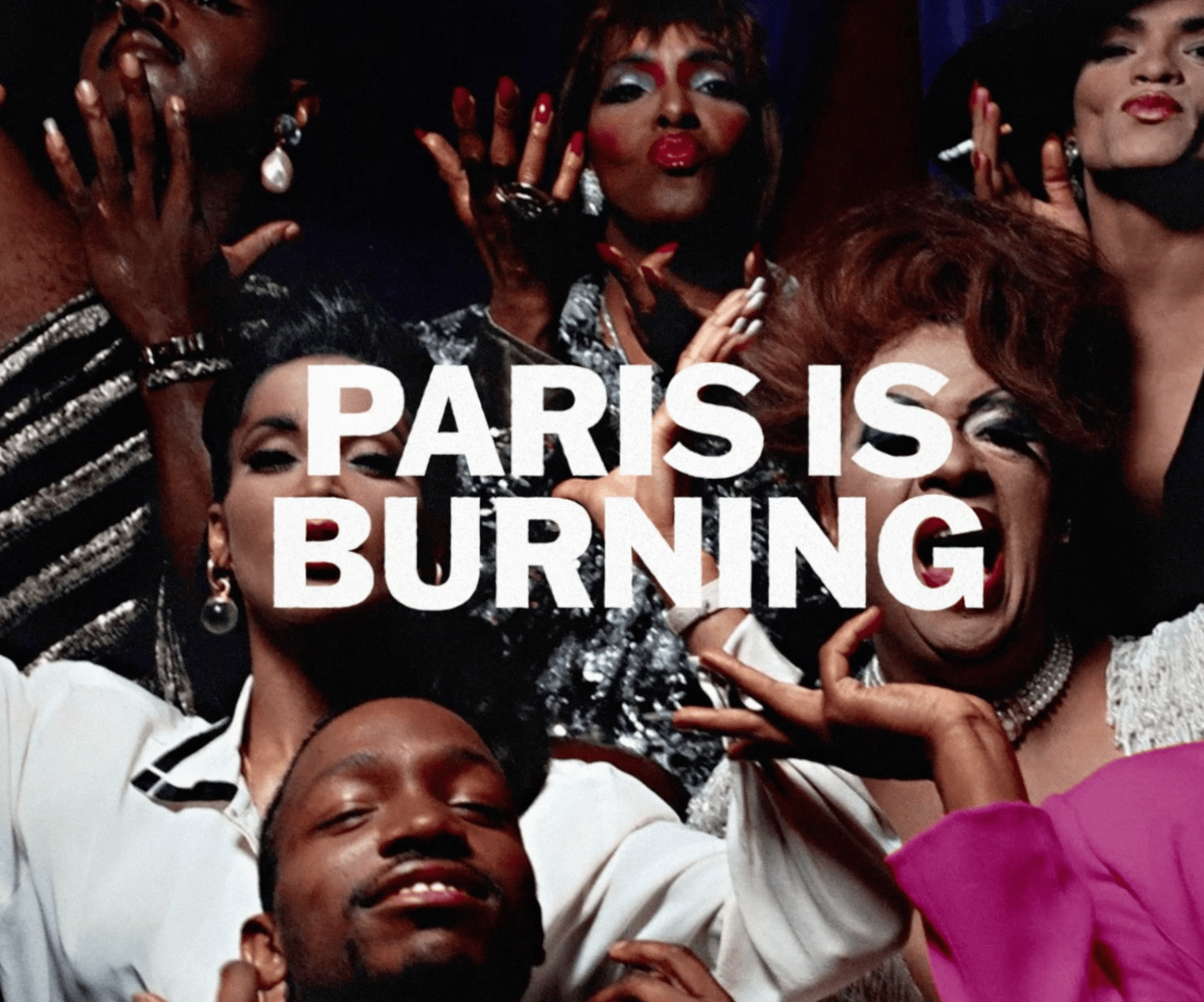 Group of joyful diverse individuals taking a selfie with a pop-up text saying "Paris is Burning" in the center.