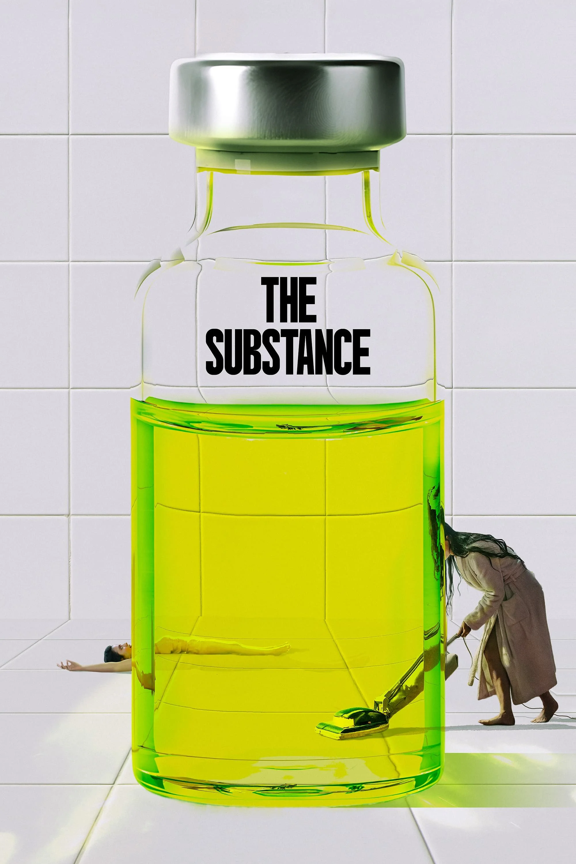 A large medicine bottle labeled 'The Substance' with green liquid inside. A woman is vacuuming the inside, and another person is lying on the floor against the bottle, with only their legs and arm visible.