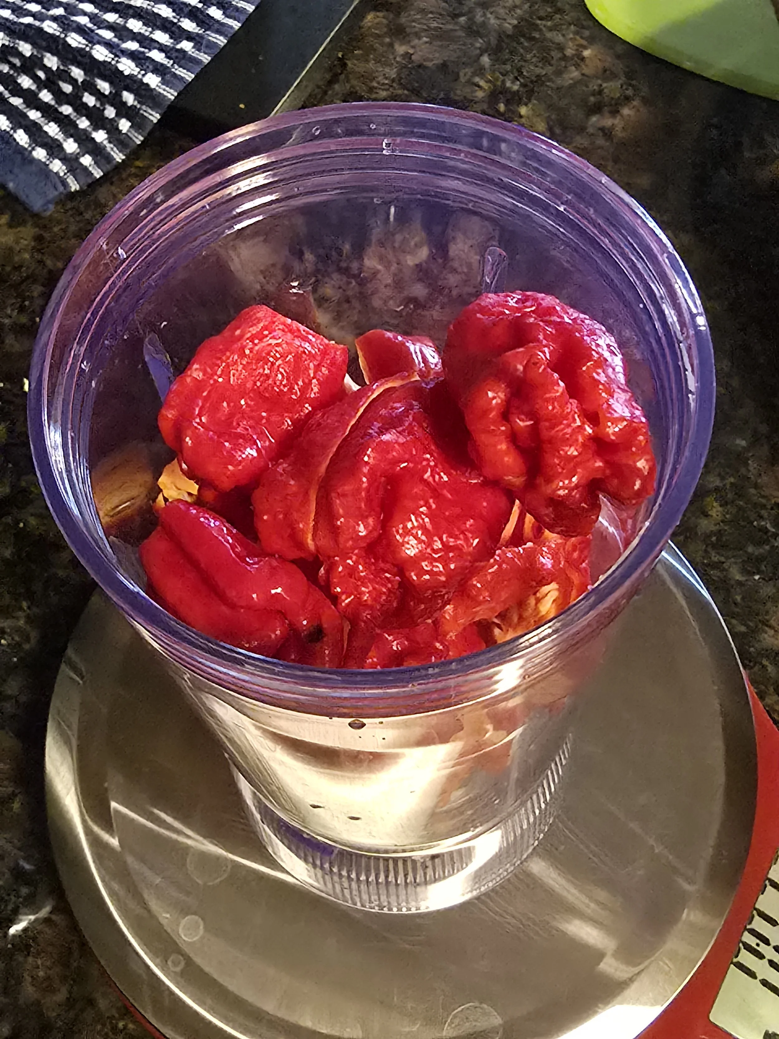 Fresh Carolina Reaper peppers being prepped for small-batch Fire On The Ridge pepper jelly.