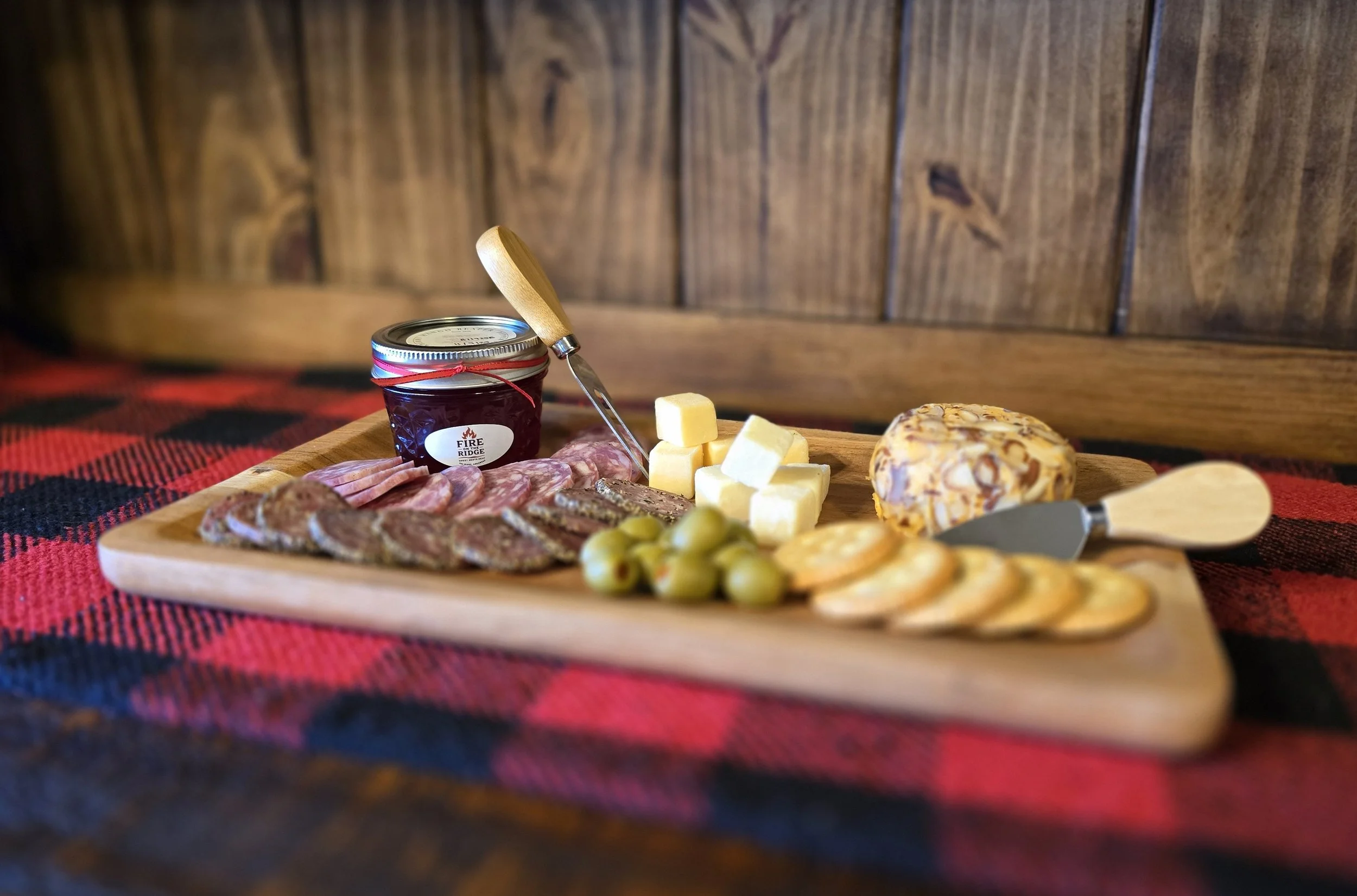 Blackberry Mango Reaper pepper jelly on charcuterie board - Blaze.jpg