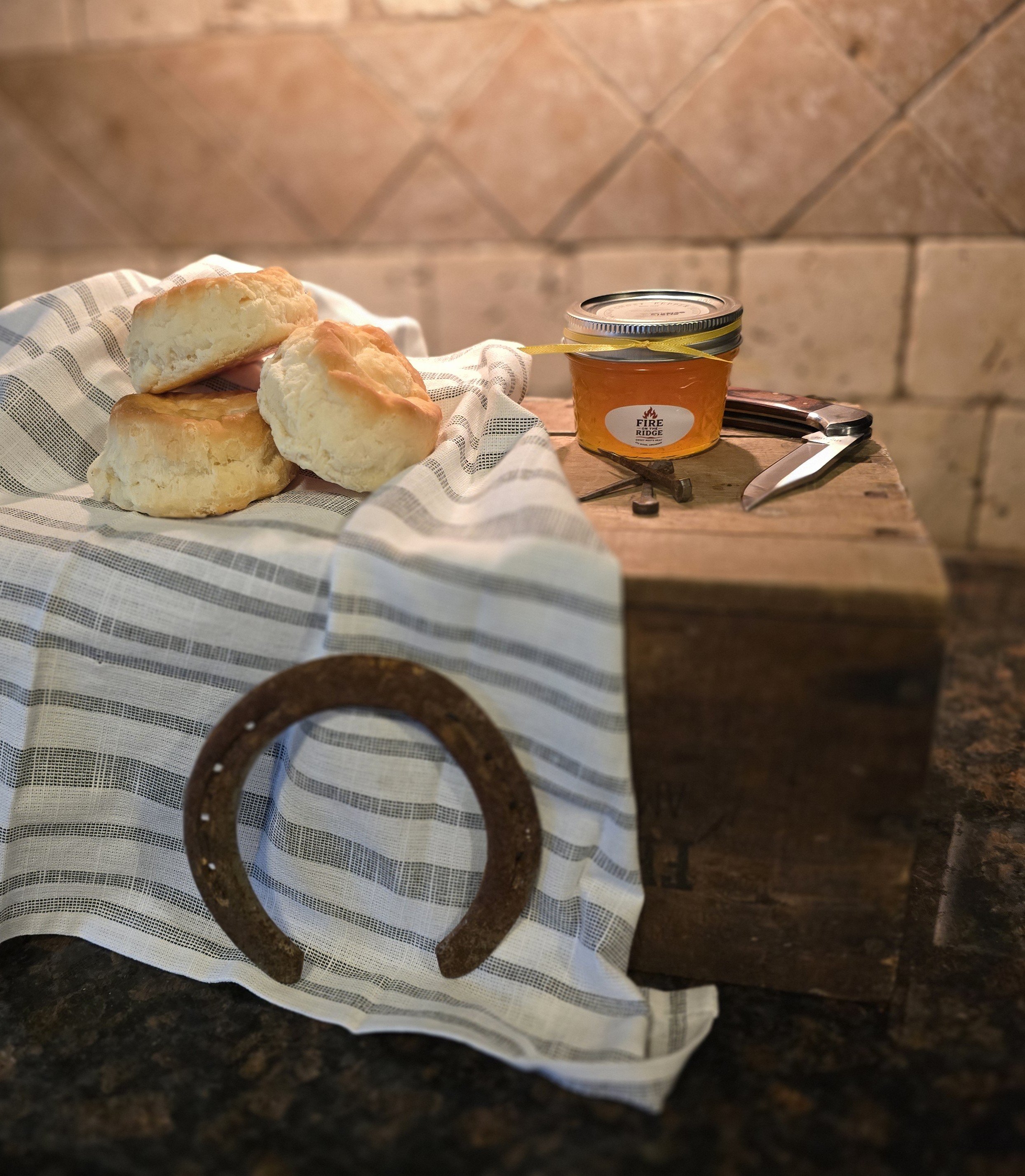 Mango Ghost pepper jelly on biscuits - Ember.jpg