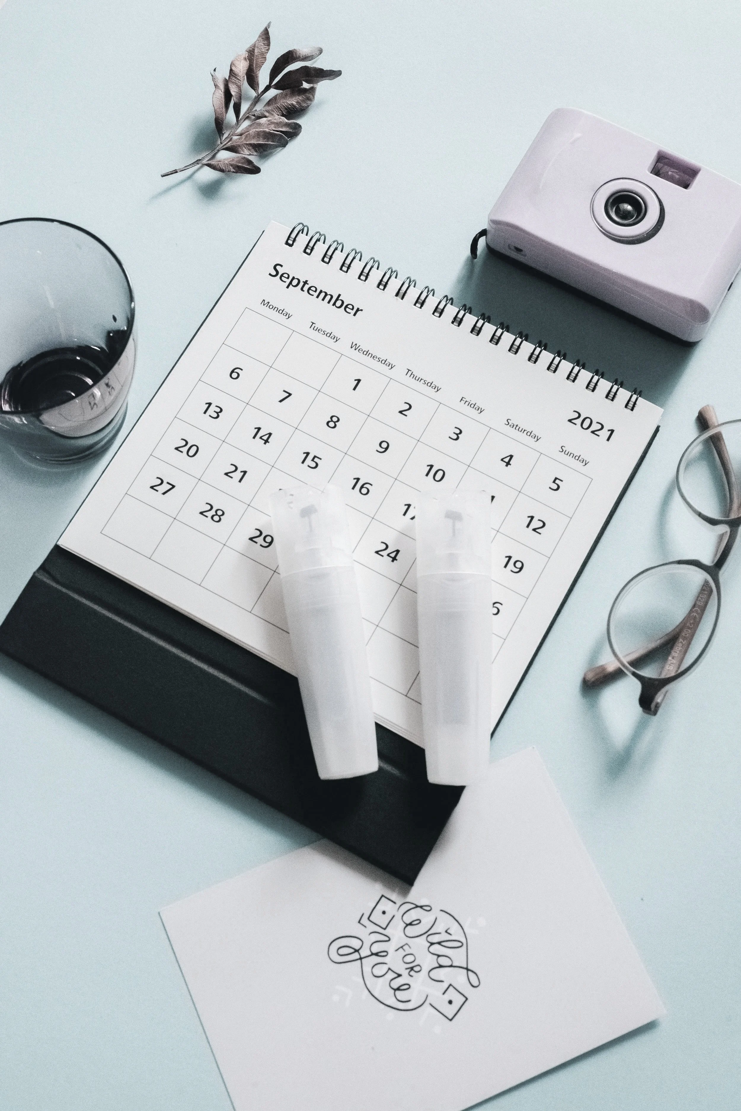 Desk setup with calendar showing one month