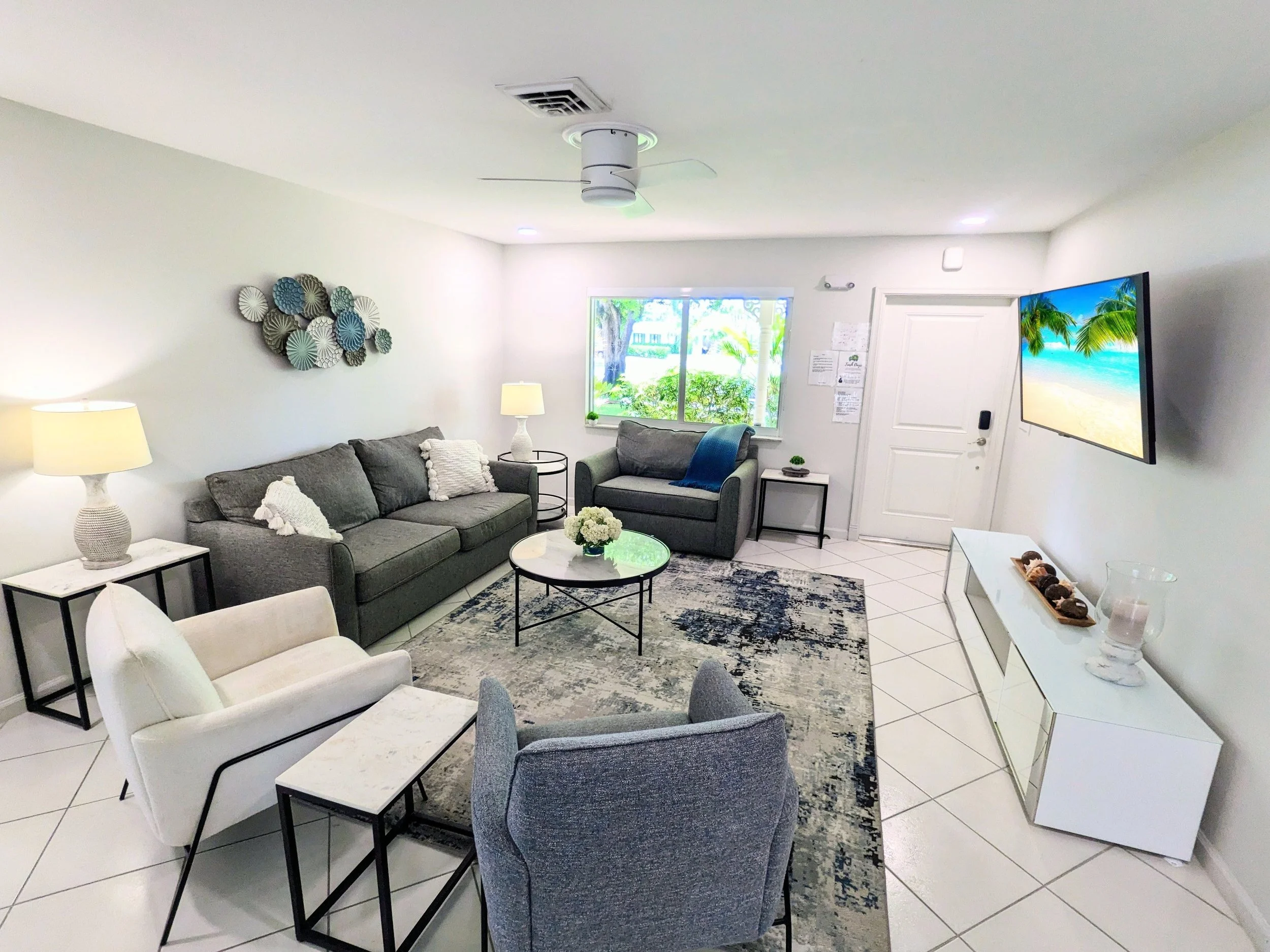 Living room has a queen sized pull-out couch. 