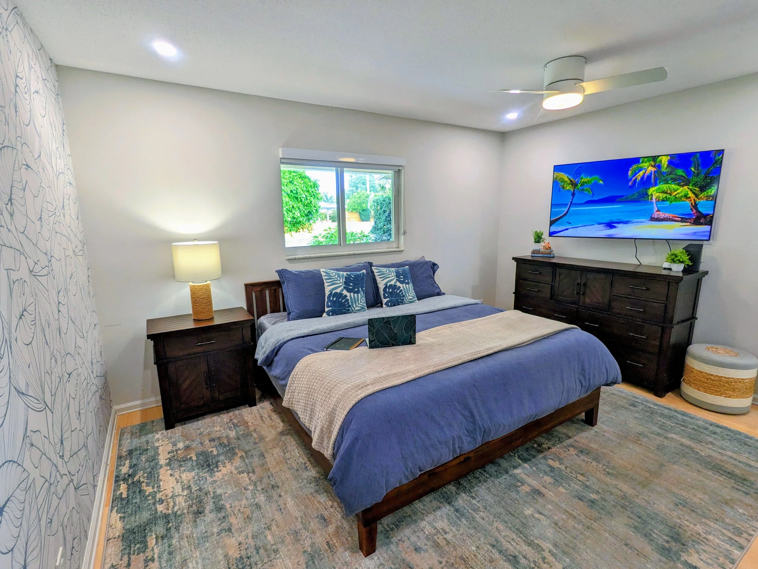 King sized bed in the Primary room. Enjoy the ensuite bathroom, walk in closet, smart tv & more.