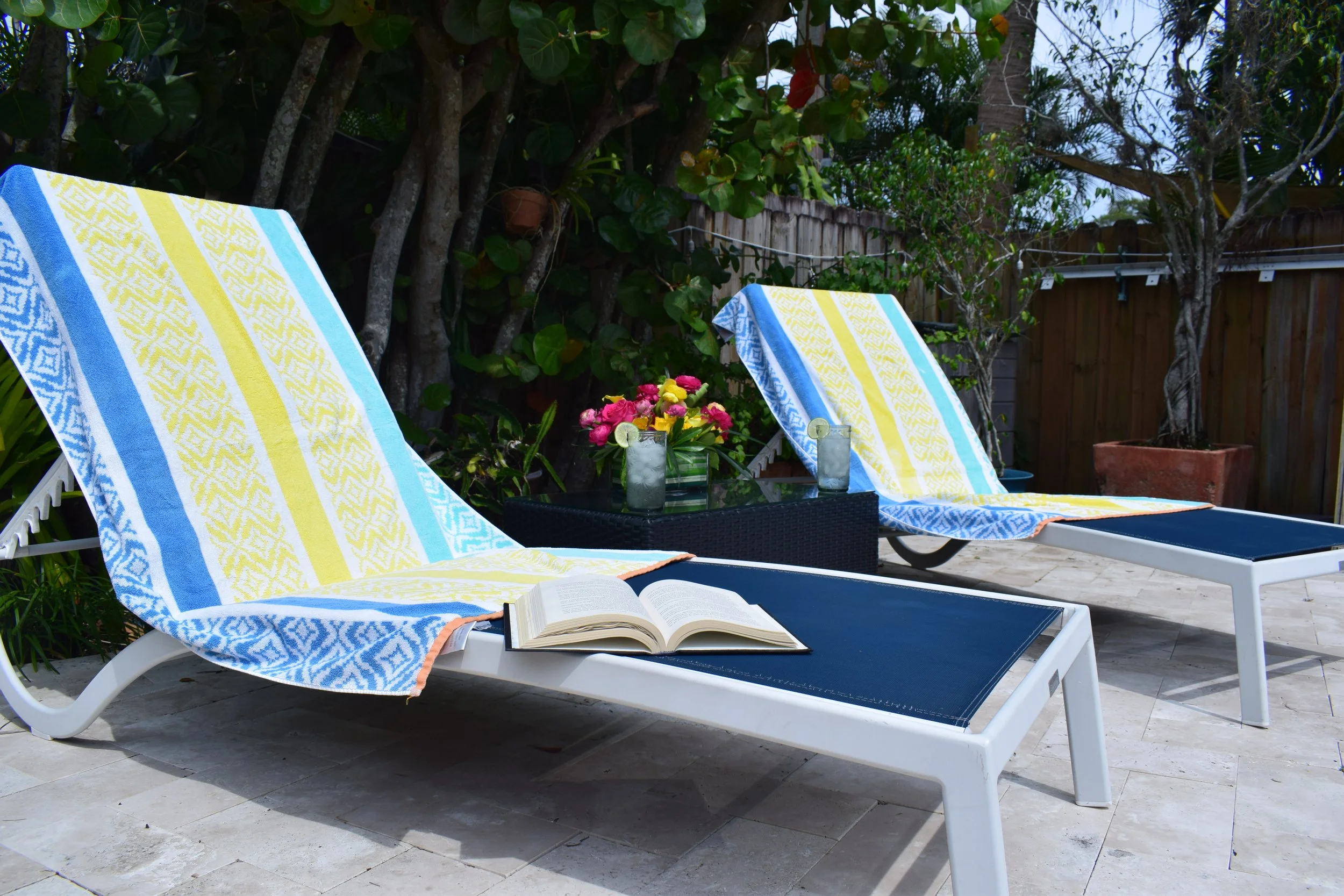 Grab your favorite book to lounge by the pool and soak up the sun.