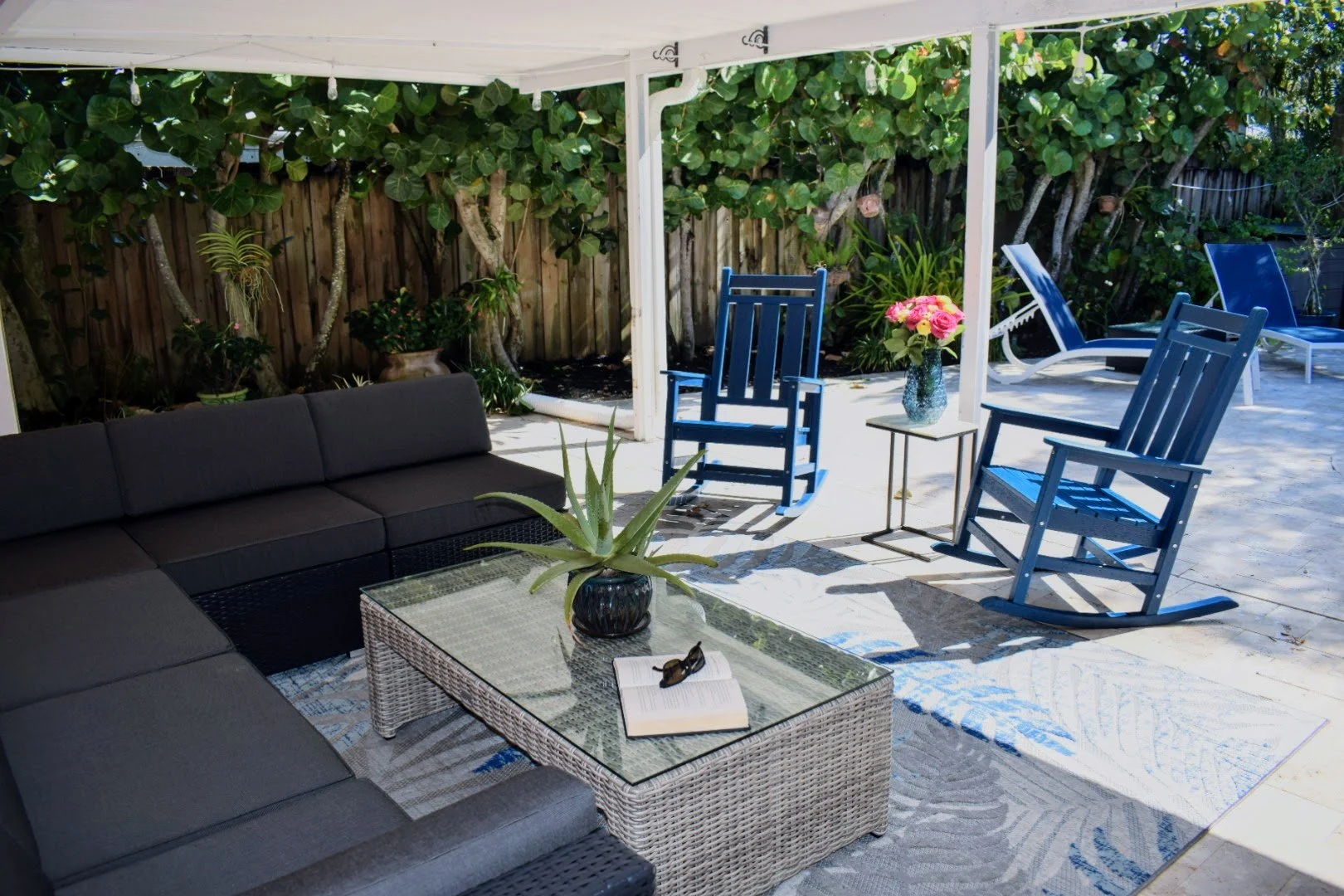 Covered Patio perfect for reading, chatting with friends, or simply relaxing outside.