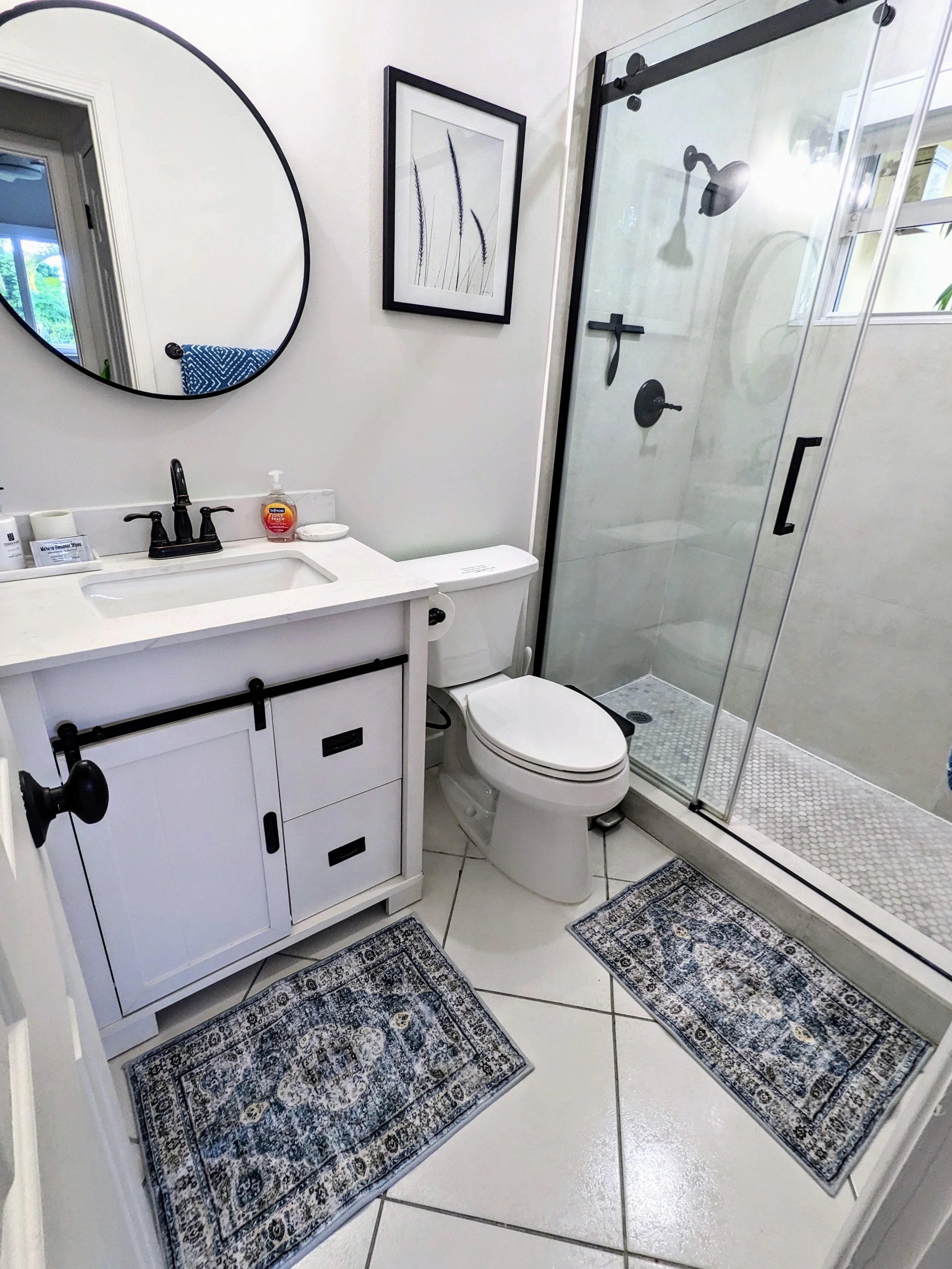 Bathroom located right off two of the bedrooms.